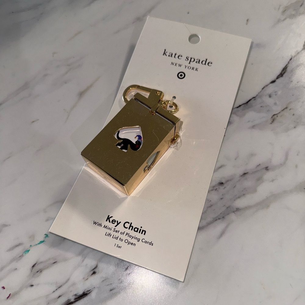 kate spade gold playing card key chain with black spade detail